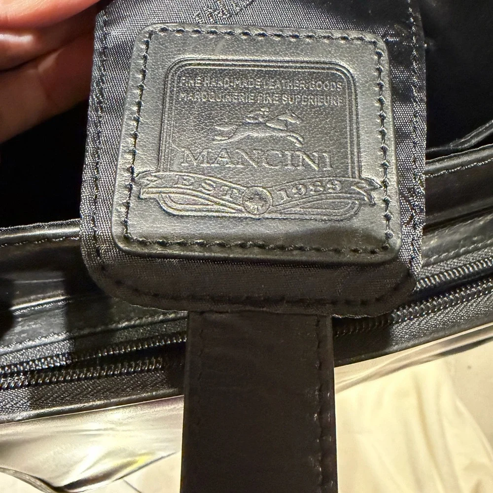 N/A mancini messenger